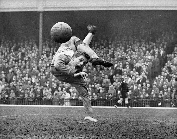 Blackpool goalkeeper Gordon West is rendered agog by his own miraculous save during a match against Arsenal at Highbury 1961.jpg